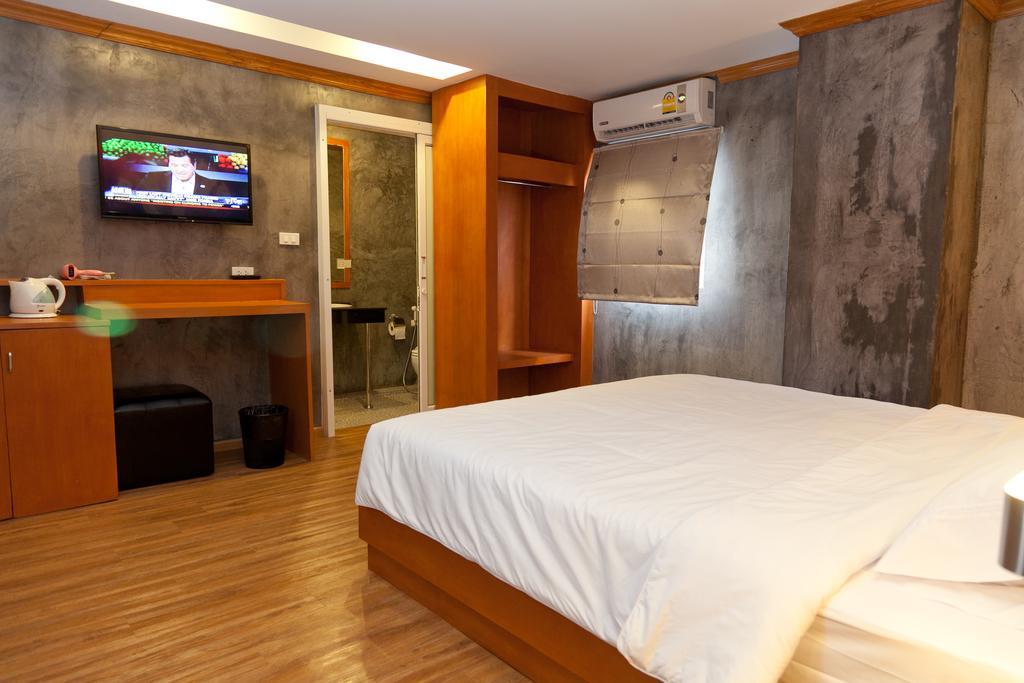 Chaphone Guesthouse Phuket Værelse billede